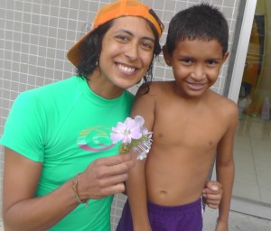 With Danielo, a very special little friend who gave me these flowers while we were walking back from the beach